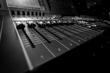 Closeup view of Faders on Professional Audio Digital Sound Mixing Control Console.
