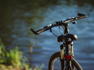 Close-up of the bike on the background of the Park. Cycling in summer