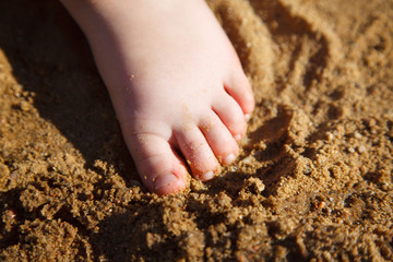 baby feet in the sand