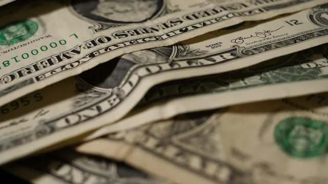 Dollar bills, money background. Dollars money set Slow Pan With Shallow Dof and smoke. Dollars, money close up.