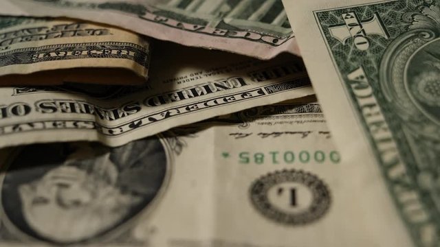 Dollar bills, money background. Dollars money set Slow Pan With Shallow Dof and smoke. Dollars, money close up.