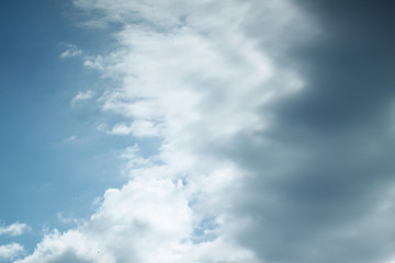 Sky blue background with clouds