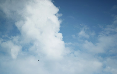 Sky blue background with cloudy