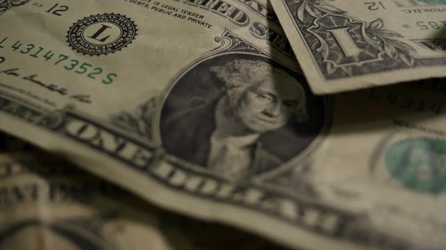 Dollar bills, money background. Dollars money set with count to bills of one hundred dollars. Closeup on the bills for a hundred dollars. Dollars, money close up.