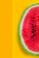 Beautiful pattern with fresh watermelon on yellow background. Top View.