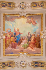 Fototapeta na wymiar MENAGGIO, ITALY - MAY 8, 2015: The neobaroque ceiling fresco of Glorification of Virgin Mary in church chiesa di Santo Stefano by Luigi Tagliaferri (1841-1927).