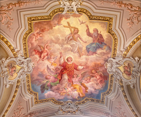 MENAGGIO, ITALY - MAY 8, 2015: The neobaroque ceiling fresco of Glory of St. Stephen in church chiesa di Santo Stefano by Luigi Tagliaferri (1841-1927).