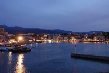 Fototapeta na wymiar Night shot from iconic Venetian port of Chania, Crete island, Greece
