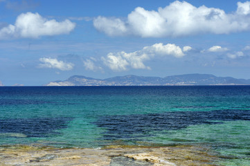 Clouds over Ibiza. View from Formentera Island.