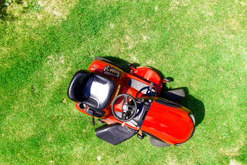 Lawn mover on grass and aerial view 