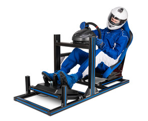 race driver in blue overall with helmet training on simracing aluminum simulator rig for video game...