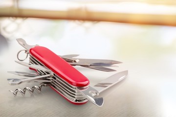 Multi-Tasking metal Penknife isolated on white