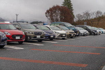 row of cars in parking
