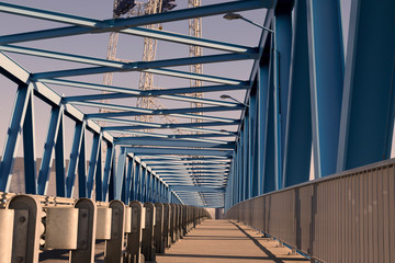 modern bridge construction and road going through the bridge