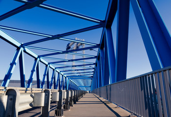 modern bridge construction and road going through the bridge