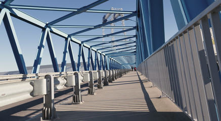 modern bridge construction and road going through the bridge