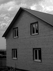 Fototapeta na wymiar unfinished wooden house on a suburban area