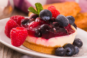 Cheesecakes with mixed berries.