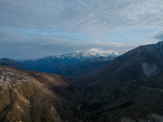 Naklejka premium ドローンで空撮した奥飛騨の山脈の風景