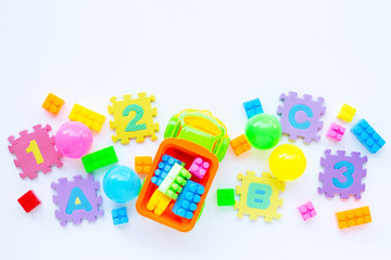 Fototapeta premium Colorful Kids toys on white background.