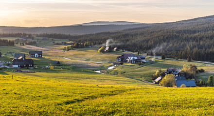 Jizerka village at sunset time. View from Bukovec Mountain, Jizera Mountains, Czech Republic