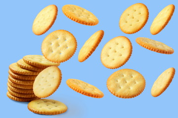 Top view of round salted snack cracker cookie isolated on blue background