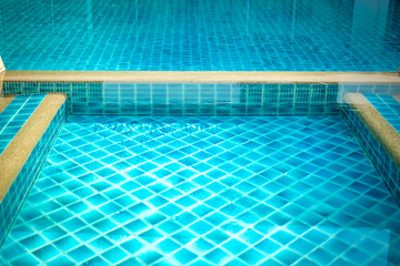 Obraz na płótnie Canvas swimming pool in hotel resort. summer holiday vacation