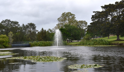 View of Lake Alford at the recreational park at the southern entry of the town of Gympie, Queensland, Australia. Fountain in the middle of the lake.