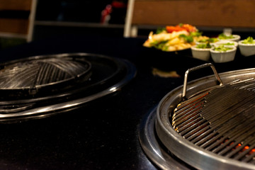 Obraz premium Thai barbecue Grill Pork on hot pan buffet, Moo-gata Pork pan It's traditional Thai style BBQ