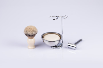 Traditional wet shaving. Shaving brush, safety razor and soap.