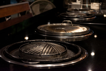 Thai barbecue Grill Pork on hot pan buffet, Moo-gata Pork pan It's traditional Thai style BBQ