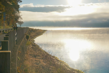 mist in the early morning with reflection on the lake Yamanaka