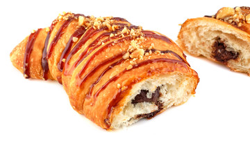 Slice croissant with chocolate isolated on white background