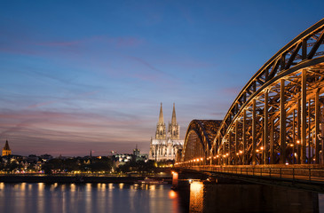 Fototapeta premium Cologne Dom with Hohenzollernbridge in afternoom