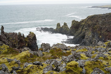 beautiful iceland fjords with waves crashing