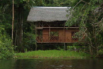 Houses in the village Santa Clara near Puerto Narino at Amazonas river in Colombia
