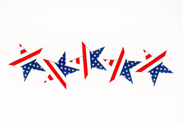 American Independence day background with blue, white and red mixed stars and hearts. Celebration of American independence day, the 4th of July (the Fourth of July). Holiday concept. With copy space. 