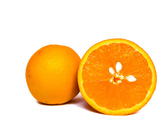 Close-up view of isolated orange halves with white seeds on white background with copy space.