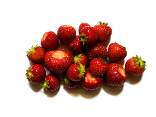 Top view of red, tasty strawberries isolated on white background.