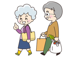 買い物帰りのシニア男女