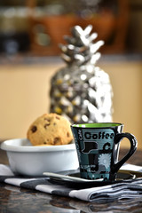 Cup of coffee and home made chocolate chip cookies