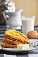 Fototapeta na wymiar French toast breakfast with cheese spread, milk and egg