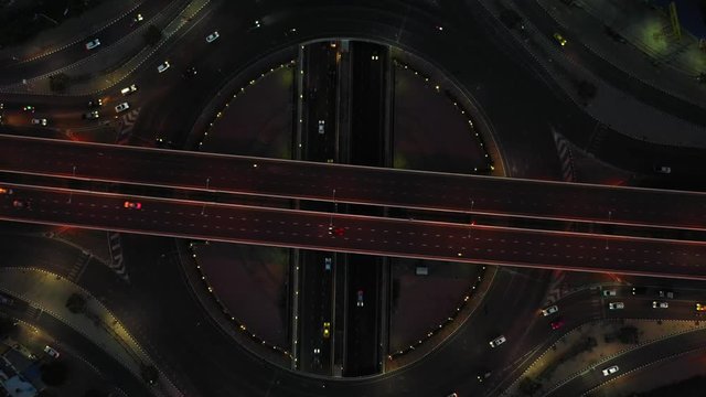 Aerial view Expressway motorway highway circus intersection at Night time Top view , Road traffic in city at thailand.