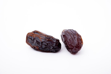 Dried dates or date fruits isolated on white background