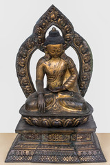 Archaeological sculpture of Sakyamuni Buddha, made of Gilded Copper, Eighteenth century of the Common Era, Nepal