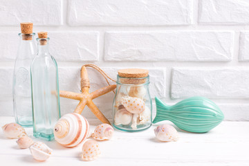 Coastal living  layout  near by white brick wall.