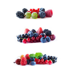 Berries isolated on white background. Ripe blueberries, blackberries, blackcurrants, strawberries, raspberries, gooseberries and red currants. Various fresh summer berry.