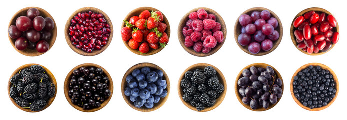 Red and black-blue food. Collage of different fruits and berries at green and red color. Top view. 