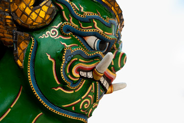 Giant head sculpture in Grand palace bangkok Thailand.