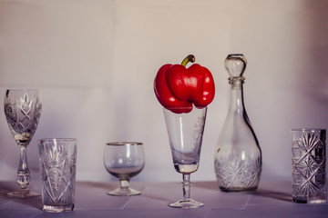 glass of wine on a red background